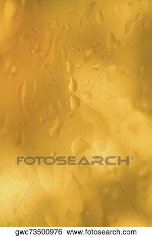 Close-up of water drops on a surface View Large Photo Image Stock Photograph - Close-up of water drops on a surface. Fotosearch