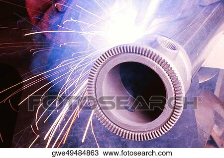 Close-up of welding on a metal pipe View Large Photo Image Stock Image - Close-up of welding on a metal pipe. Fotosearch