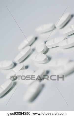 Close-up of white tablets View Large Photo Image Stock Image - Close-up of white tablets. Fotosearch