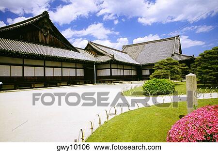 Stock Photograph - Formal garden in front of a building, Nijo Castle, Kyoto, Japan. Fotosearch