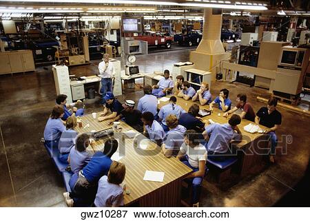 Group of people in a meeting at an industry, Smyrna, Georgia, USA View Large Photo Image Stock Photo - Group of people in a meeting at an industry, Smyrna, Georgia, USA. Fotosearch
