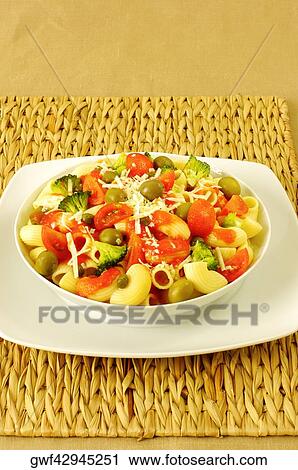 High angle view of a bowl of pasta View Large Photo Image Stock Image - High angle view of a bowl of pasta. Fotosearch
