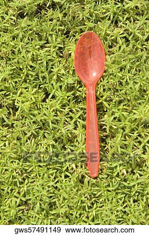 High angle view of a disposable spoon on the grass View Large Photo Image Stock Photo - High angle view of a disposable spoon on the grass. Fotosearch