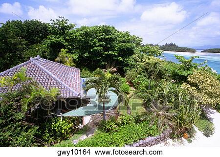 High angle view of a house on the beach, Kabira Bay, Ishigaki, Ryukyus, Japan View Large Photo Image Picture - High angle view of a house on the beach, Kabira Bay, Ishigaki, Ryukyus, Japan. Fotosearch