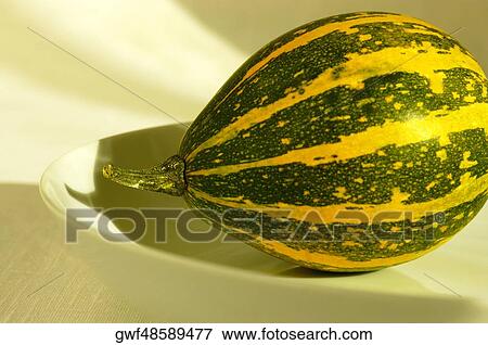 High angle view of a pumpkin in a bowl View Large Photo Image Stock Photo - High angle view of a pumpkin in a bowl. Fotosearch