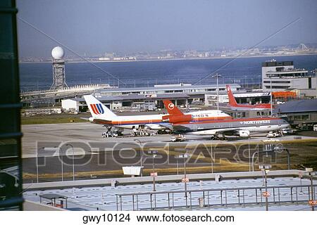 High angle view of airplanes at an airport, Kansai International Airport, Osaka, Japan View Large Photo Image Picture - High angle view of airplanes at an airport, Kansai International Airport, Osaka, Japan. Fotosearch