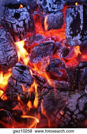 High angle view of firewood burning View Large Photo Image Stock Photo - High angle view of firewood burning. Fotosearch