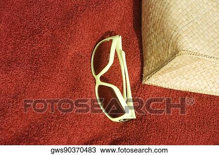 High angle view of sunglasses and a bag lying on a picnic blanket View Large Photo Image Stock Image - High angle view of sunglasses and a bag lying on a picnic blanket. Fotosearch