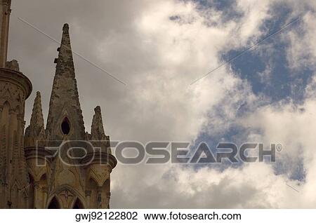 Stock Image - Low angle view of a church, Parroquia Tower, Mexico. Fotosearch