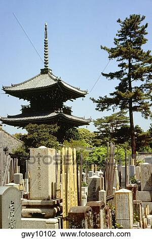 Low angle view of a pagoda in a graveyard, Chinoji Temple Graveyard, Kyoto, Japan View Large Photo Image Stock Image - Low angle view of a pagoda in a graveyard, Chinoji Temple Graveyard, Kyoto, Japan. Fotosearch