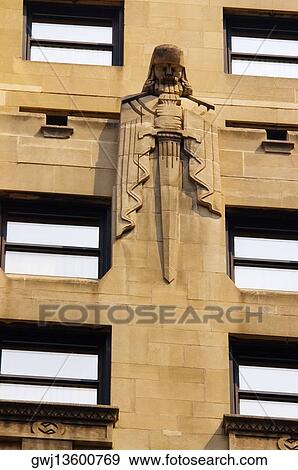 Low angle view of a sculpture on a building, Chicago, Illinois, USA View Large Photo Image Stock Photo - Low angle view of a sculpture on a building, Chicago, Illinois, USA. Fotosearch