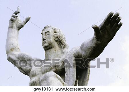 Low angle view of a statue, Peace Memorial Statue, Nagasaki, Japan View Large Photo Image Stock Image - Low angle view of a statue, Peace Memorial Statue, Nagasaki, Japan. Fotosearch