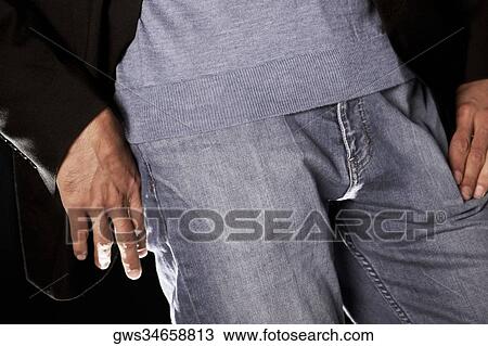 Mid section view of a mid adult man View Large Photo Image Stock Image - Mid section view of a mid adult man. Fotosearch
