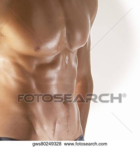 Stock Photo - Mid section view of a muscular man. Fotosearch
