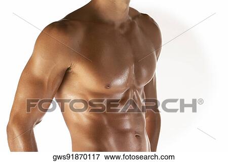 Mid section view of a muscular man View Large Photo Image Stock Photo - Mid section view of a muscular man. Fotosearch