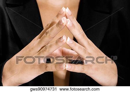 Mid section view of a young woman View Large Photo Image Stock Image - Mid section view of a young woman. Fotosearch