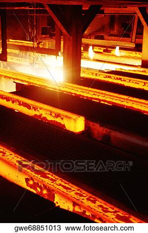 Oxygen torches cutting steel in a steel mill, Illinois, USA View Large Photo Image Stock Image - Oxygen torches cutting steel in a steel mill, Illinois, USA. Fotosearch