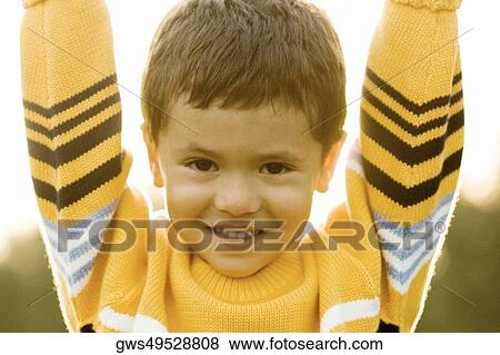 Stock Photo - Portrait of a boy smiling. Fotosearch