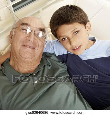 Portrait of a boy with his grandfather View Large Photo Image Stock Photograph - Portrait of a boy with his grandfather. Fotosearch