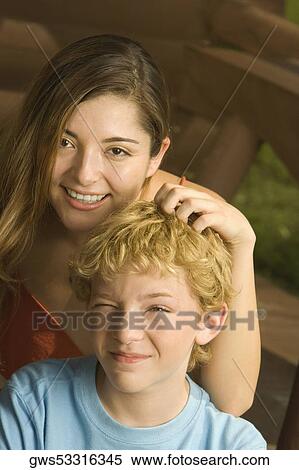 Portrait of a brother and his sister smiling View Large Photo Image Stock Photography - Portrait of a brother and his sister smiling. Fotosearch