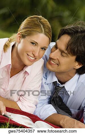Portrait of a businesswoman and a businessman smiling View Large Photo Image Stock Photo - Portrait of a businesswoman and a businessman smiling. Fotosearch