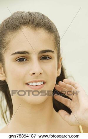 Stock Photo - Portrait of a girl posing. Fotosearch