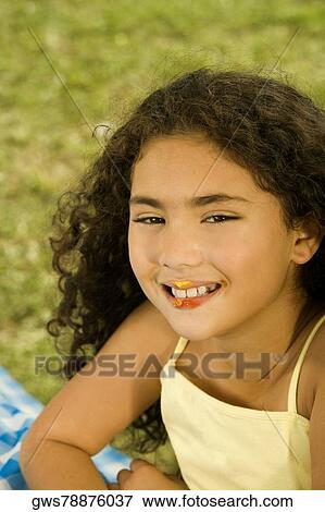 Portrait of a girl smiling View Large Photo Image Stock Photo - Portrait of a girl smiling. Fotosearch