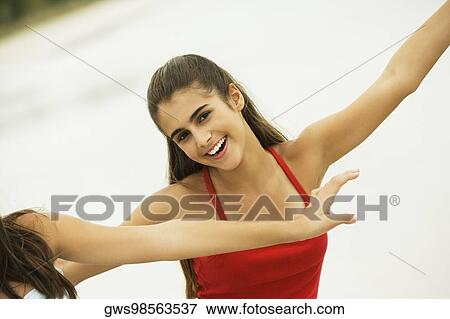 Stock Photo - Portrait of a girl smiling. Fotosearch