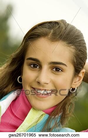 Stock Photography - Portrait of a girl smiling. Fotosearch