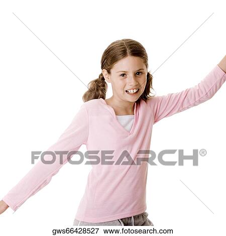 Portrait of a girl smiling with her hand raised View Large Photo Image Stock Photo - Portrait of a girl smiling with her hand raised. Fotosearch