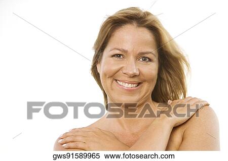 Portrait of a mature woman smiling View Large Photo Image Stock Photography - Portrait of a mature woman smiling. Fotosearch