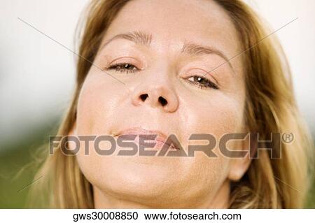 Portrait of a mature woman thinking View Large Photo Image Stock Image - Portrait of a mature woman thinking. Fotosearch