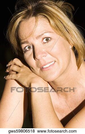Portrait of a mature woman thinking View Large Photo Image Stock Photo - Portrait of a mature woman thinking. Fotosearch