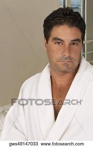 Portrait of a mid adult man in a bathrobe View Large Photo Image Stock Image - Portrait of a mid adult man in a bathrobe. Fotosearch