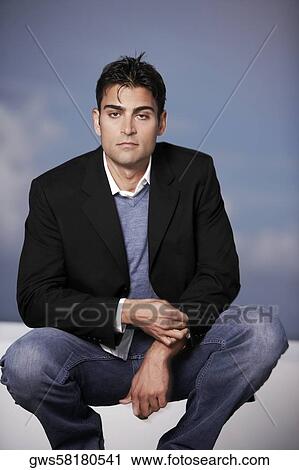 Portrait of a mid adult man looking serious View Large Photo Image Stock Image - Portrait of a mid adult man looking serious. Fotosearch