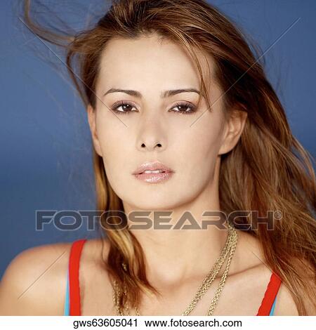 Portrait of a mid adult woman looking serious View Large Photo Image Stock Image - Portrait of a mid adult woman looking serious. Fotosearch