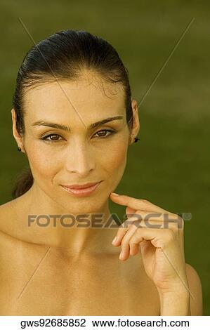 Stock Image - Portrait of a mid adult woman. Fotosearch