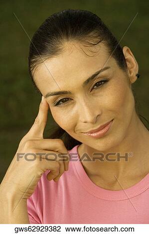 Portrait of a mid adult woman thinking View Large Photo Image Stock Image - Portrait of a mid adult woman thinking. Fotosearch