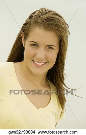 Portrait of a teenage girl smiling View Large Photo Image Picture - Portrait of a teenage girl smiling. Fotosearch