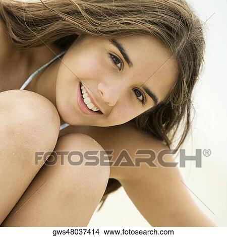 Portrait of a teenage girl smiling View Large Photo Image Picture - Portrait of a teenage girl smiling. Fotosearch