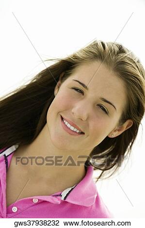 Portrait of a teenage girl smiling View Large Photo Image Stock Image - Portrait of a teenage girl smiling. Fotosearch