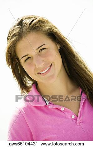 Portrait of a teenage girl smiling View Large Photo Image Stock Image - Portrait of a teenage girl smiling. Fotosearch