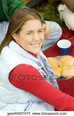 Portrait of a teenage girl smiling View Large Photo Image Stock Image - Portrait of a teenage girl smiling. Fotosearch