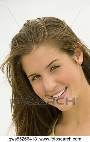Portrait of a teenage girl smiling View Large Photo Image Stock Photo - Portrait of a teenage girl smiling. Fotosearch