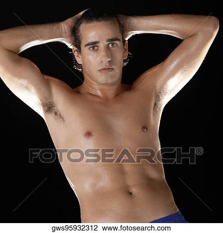 Portrait of a young man posing View Large Photo Image Stock Image - Portrait of a young man posing. Fotosearch