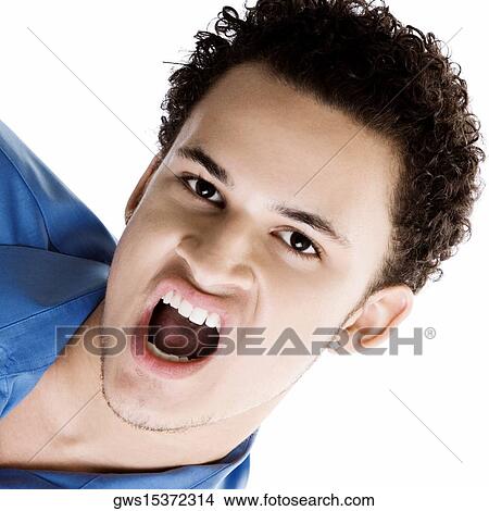 Picture - Portrait of a young man shouting. Fotosearch