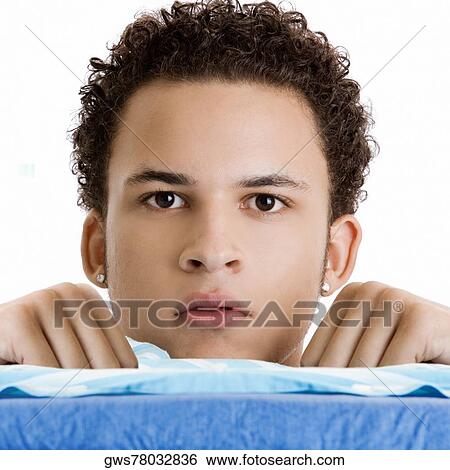 Stock Photograph - Portrait of a young man. Fotosearch