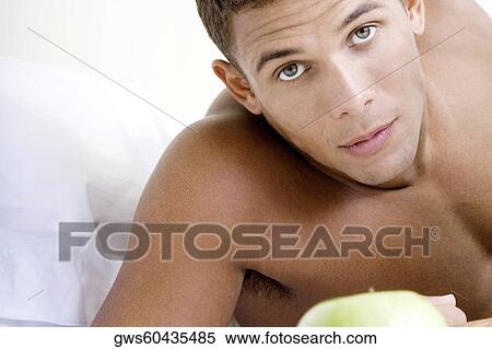 Portrait of a young man View Large Photo Image Stock Photography - Portrait of a young man. Fotosearch