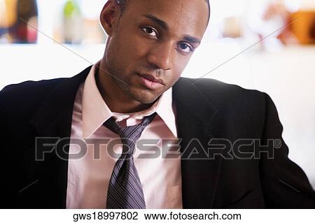 Portrait of a young man thinking View Large Photo Image Stock Image - Portrait of a young man thinking. Fotosearch
