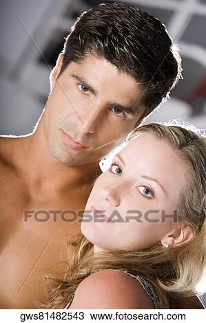 Portrait of a young woman and a mid adult man View Large Photo Image Stock Image - Portrait of a young woman and a mid adult man. Fotosearch